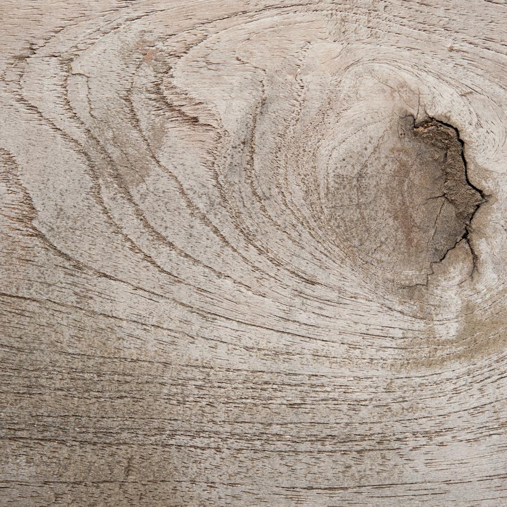 Highly detailed wooden texture showcasing natural grain pattern and knot.